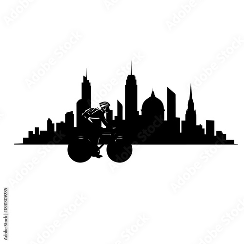 man cycling in a big city silhouette