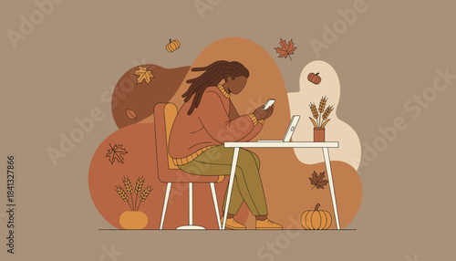 Autumn remote work Person using smartphone at a desk decorated with fall leaves and pumpkins