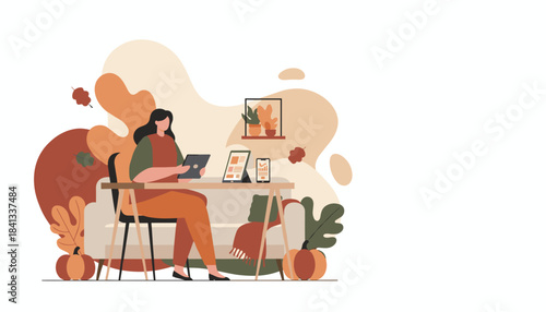 Woman working from home office in autumn setting using a tablet Remote work lifestyle concept