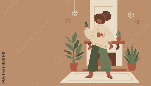 Cozy woman enjoys hot drink and smartphone use by fireplace during winter holidays