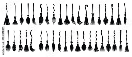 collection of black silhouette witch brooms with varied 