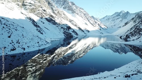 Aerial Drone View of Snow-Capped Mountains and Blue River