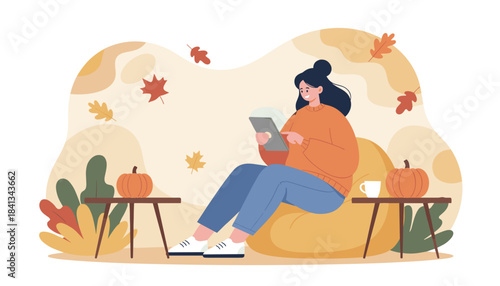 Woman using tablet in cozy autumn scene with pumpkins and fall leaves