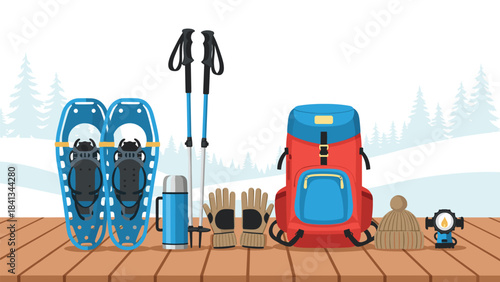 Snowshoes, backpack, and gear on a wooden deck in winter setting with snowshoeing equipment and accessories