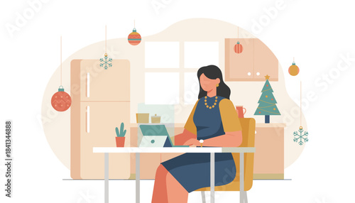 Working from home during Christmas holidays Woman using laptop in a decorated kitchen