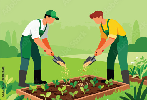 Two gardeners tending to young plants in a raised garden bed