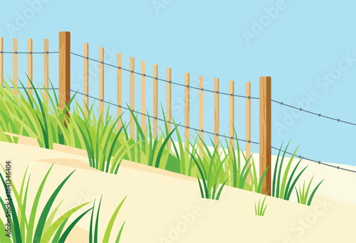 Sand dunes with green grass and a wooden post fence under a pale blue sky