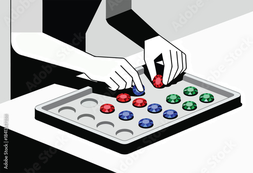 Hands arrange colorful gems in a tray