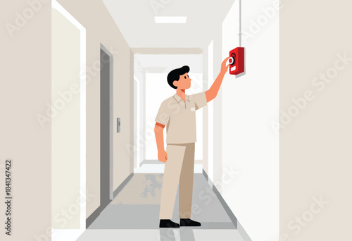 A person in uniform reaches for a red emergency alarm box on a hallway wall