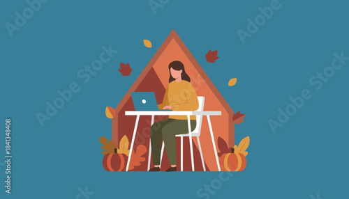 Remote work woman using laptop in cozy autumn home office setting