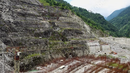 Wide Shot of Massive Engineering Project in Asian Mountains