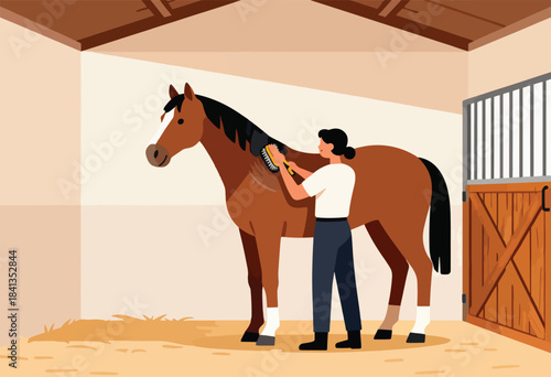 Person grooming a brown horse inside a stable with wooden doors and gate