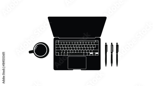 Modern workspace setup with laptop computer, coffee cup, and pens on clean white desk for productivity and business work
