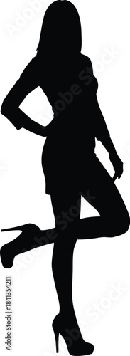 Silhouette of a stylish woman posing confidently in high heels
