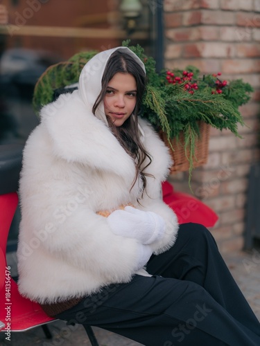 Portrait Woman on Red Scooter with Christmas Basket