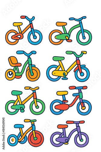Brightly colored assortment of kids bikes balance bikes and tricycles for toddlers