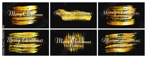 Merry Christmas and Happy New Year incription on gold smear