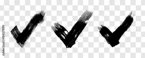 Set of black grunge brushstrokes in the shape of a check mark
