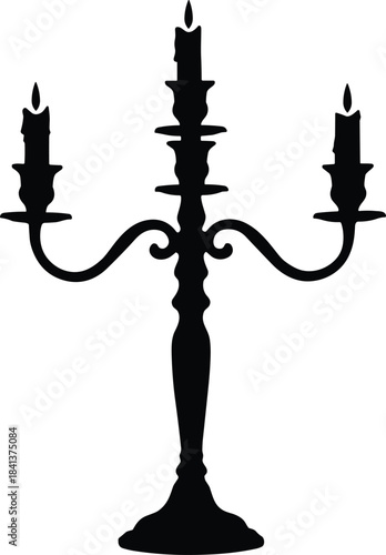 Three arm candelabrum silhouette with lit candles, ornate candle holder, vintage classical decor, elegant antique lighting, romantic ambiance, decorative accessory