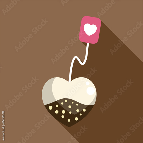 Heart shaped tea bag with label featuring a white heart