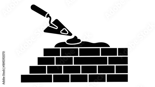 Building a brick wall with a trowel and mortar, a construction concept icon