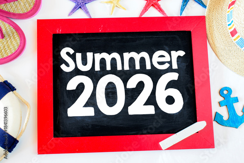 The word Summer 2026 written on a chalkboard.