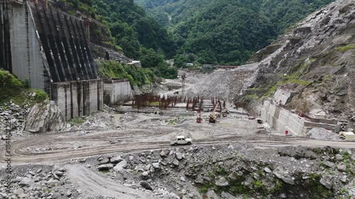 Aerial View of Heavy Civil Engineering at Arun III Hydropower Project Site in Nepal Himalayas - Massive Dam Construction and Rebar Installation for Green Energy
