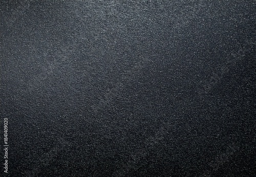 grainy black abs plastic texture matte epoxy powder coating metal surface dark background	