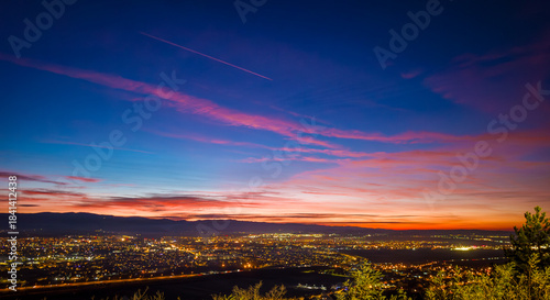 Sibiu Town at Dusk with Majestic Mountain Backdrop