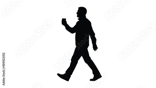 Silhouette of a man walking while holding a smartphone or small object