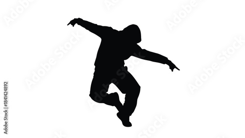 Silhouette of a hip hop dancer in an energetic pose