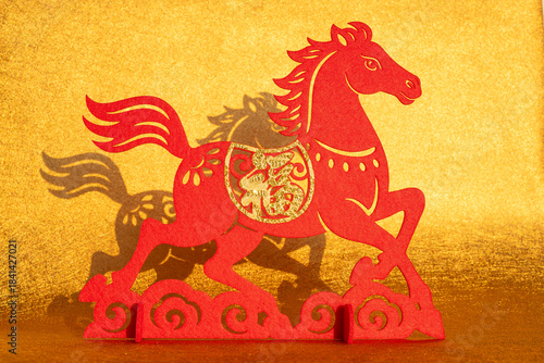Chinese New Year of Horse 2026 mascot on a gold background translation of the Chinese word is fortune no logo no trademark
