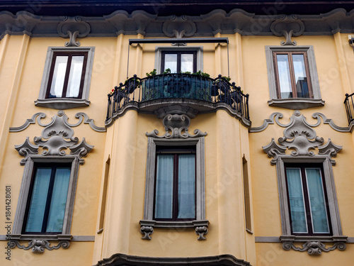 Old residential building along Via Guerrazzi in Milan, Italy