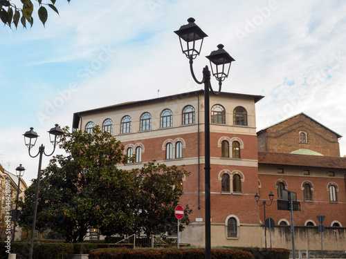 Old residential buildings along Piazza dei Volontari in Milan, Italy