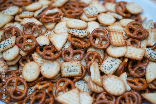 pretzels and biscuits placed on a plate. detail.