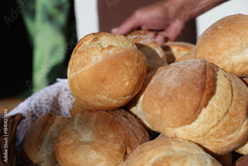 baker holding bread