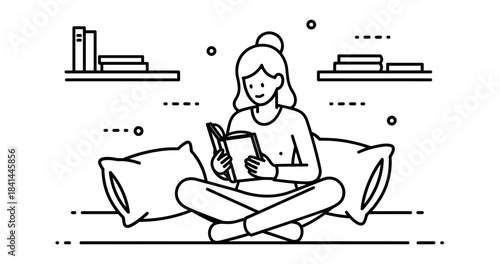 Young caucasian female reading book in minimalist setting