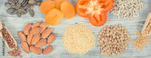 Various nutritious products or ingredients containing vitamins and minerals for healthy and lush hair