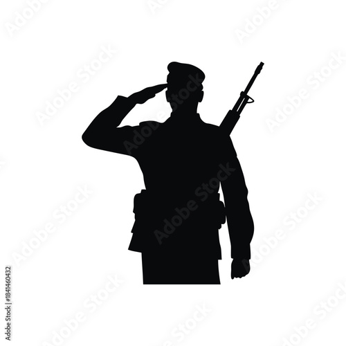 Silhouette of a saluting soldier with rifle standing in respect and honor