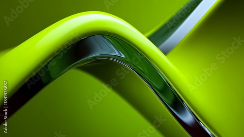 Green and silver object with a curved shape. The object is made of metal and has a shiny appearance