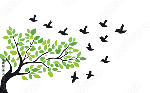 Tree with bird flying