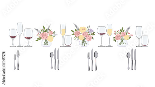 Table setting with wine glasses and floral arrangements on white tablecloth