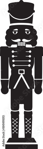 Black and white nutcracker soldier with detailed uniform and hat standing upright