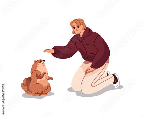 Owner teaches spitz to follow command bunny. Happy dog stands on hind legs. Trainer does obedience training with puppy of Pomeranian. Girl plays with pup. Flat isolated vector illustration in white.