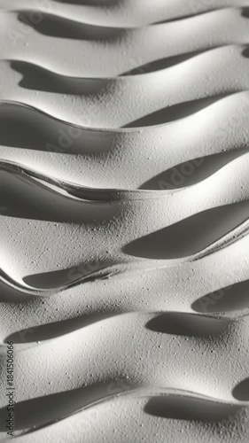 Shifting sand patterns: mesmerizing movement in desertlike waves. Color Trend 2026. 