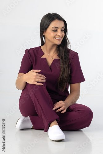 Beautiful woman wearing professional medical healthcare lab coat in studio photography