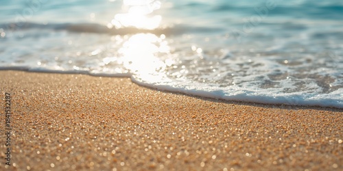 Fototapeta Naklejka Na Ścianę i Meble -  Close-up of a sandy beach with textured grains, used as a background for layout and text design, Earth Day