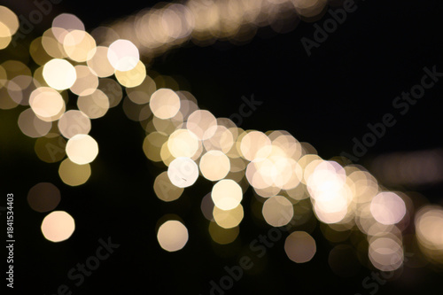 Blurry defocused lights in night time. Blurred background.