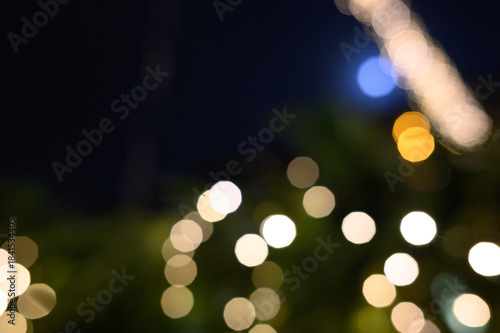 Blurry defocused lights in night time. Blurred background.