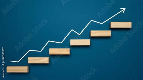 Climbing Success Steps: Upward Trend Line and Wooden Blocks Symbolizing Business Growth, Career Development, Strategy, and Financial Progress